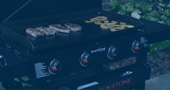 Blackstone Griddle Cooking Meat with Blue Overlay