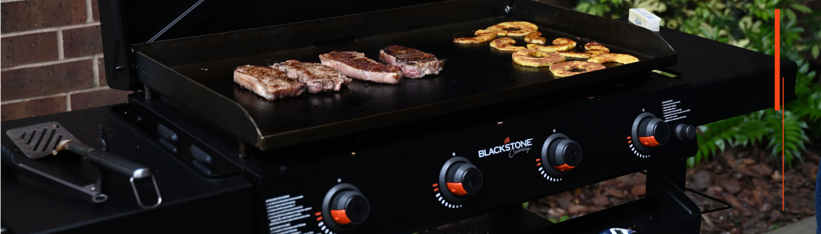 Steaks and pineapple on Blackstone Grill