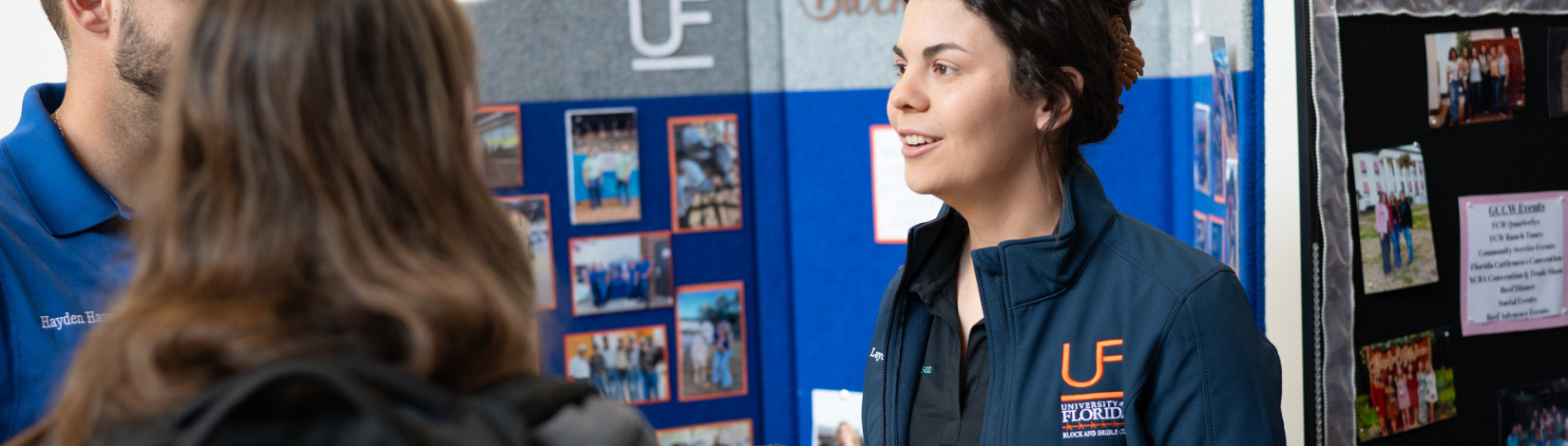 Four students talking outside